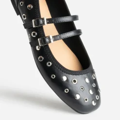 Babies noires décor œillets et clous