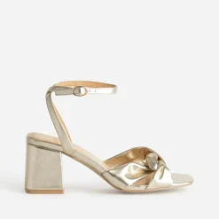 Sandale à talon or brides nouées